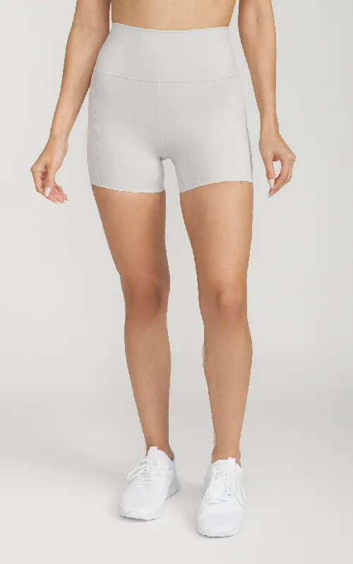 Skort – A hybrid of shorts and a skirt, with a skirt overlay at the front for a feminine touch.Skort – A hybrid of shorts and a skirt, with a skirt overlay at the front for a feminine touch.Bliss Biker Short 4" With Pockets in Wind Chime