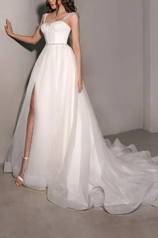 Corset dress – Dress designed with a built-in corset or lace-up feature to create a cinched, structured waist.Corset dress – Dress designed with a built-in corset or lace-up feature to create a cinched, structured waist.A Line Sweetheart Beads Tulle Simple Wedding Dress QW2645