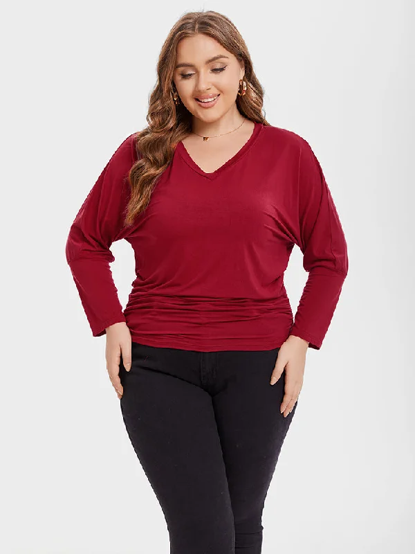 Crop – Shortened length, typically above the waistCrop – Shortened length, typically above the waistV-Neck Batwing Sleeve Ruched Tee Crop – Shortened length, typically above the waistCrop – Shortened length, typically above the waistV-Neck Batwing Sleeve Ruched Tee