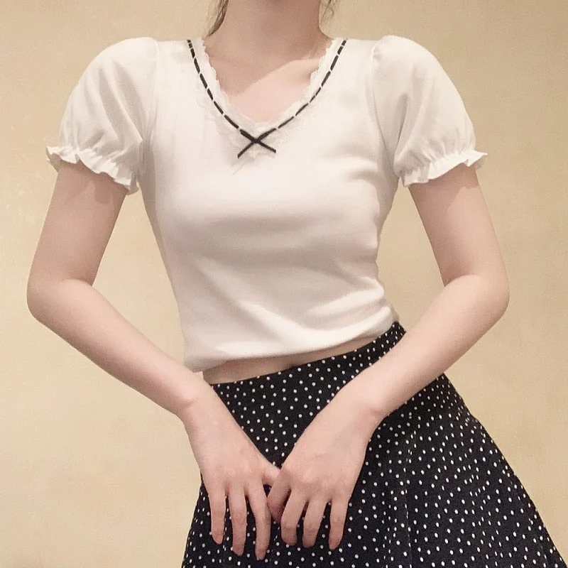 Cotton blend – Mix of cotton and synthetic fabrics for softness and durabilityCotton blend – Mix of cotton and synthetic fabrics for softness and durabilityAcademia Inspired Black Bow Tee Cotton blend – Mix of cotton and synthetic fabrics for softness and durabilityCotton blend – Mix of cotton and synthetic fabrics for softness and durabilityAcademia Inspired Black Bow Tee