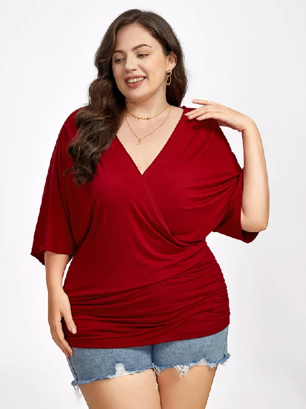 Knit – Soft and stretchy fabric with a knitted textureKnit – Soft and stretchy fabric with a knitted texturePlus Plain Crisscross V Neck Ruched Hem Tee Knit – Soft and stretchy fabric with a knitted textureKnit – Soft and stretchy fabric with a knitted texturePlus Plain Crisscross V Neck Ruched Hem Tee