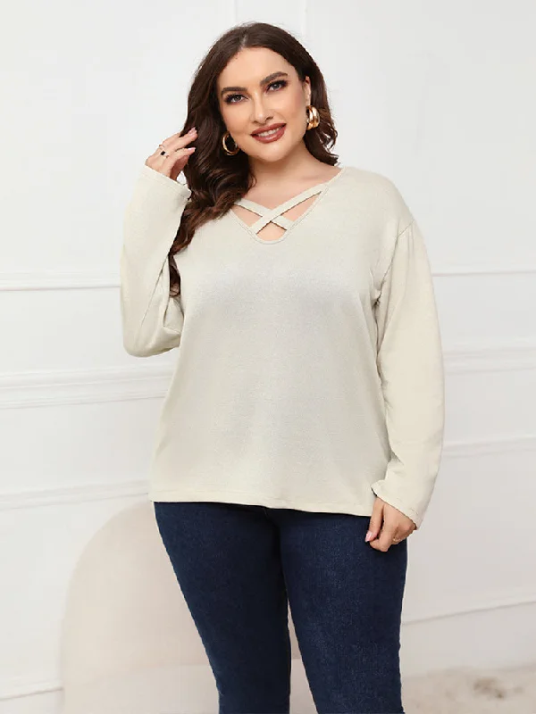 Henley – T-shirt with a buttoned placket (usually a few buttons near the collar)Henley – T-shirt with a buttoned placket (usually a few buttons near the collar)Plus Plain Crisscross V Neck Tee