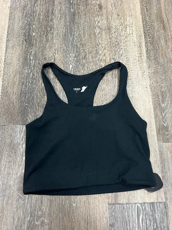 Racerback sports bra – Sports bra with a back design that features straps that meet in a "V" or "Y" shape, offering better shoulder mobility.Racerback sports bra – Sports bra with a back design that features straps that meet in a "V" or "Y" shape, offering better shoulder mobility.Black Athletic Bra Fundamental Performance, Size M Racerback sports bra – Sports bra with a back design that features straps that meet in a "V" or "Y" shape, offering better shoulder mobility.Racerback sports bra – Sports bra with a back design that features straps that meet in a "V" or "Y" shape, offering better shoulder mobility.Black Athletic Bra Fundamental Performance, Size M
