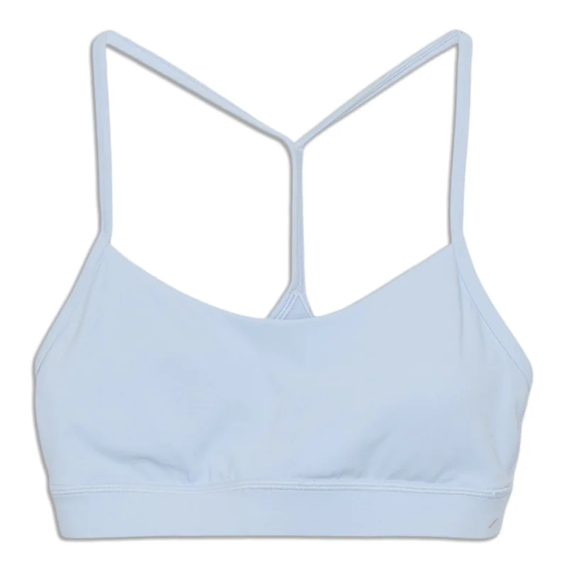 Racerback sports bra – Sports bra with a back design that features straps that meet in a "V" or "Y" shape, offering better shoulder mobility.Racerback sports bra – Sports bra with a back design that features straps that meet in a "V" or "Y" shape, offering better shoulder mobility.Flow Y Bra - Resale Racerback sports bra – Sports bra with a back design that features straps that meet in a "V" or "Y" shape, offering better shoulder mobility.Racerback sports bra – Sports bra with a back design that features straps that meet in a "V" or "Y" shape, offering better shoulder mobility.Flow Y Bra - Resale