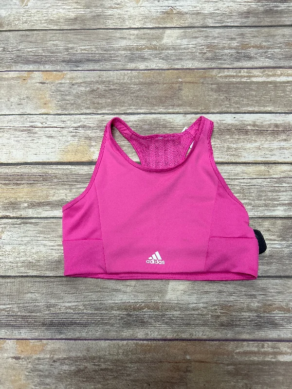 Racerback sports bra – Sports bra with a back design that features straps that meet in a "V" or "Y" shape, offering better shoulder mobility.Racerback sports bra – Sports bra with a back design that features straps that meet in a "V" or "Y" shape, offering better shoulder mobility.Pink Athletic Bra Adidas, Size S Racerback sports bra – Sports bra with a back design that features straps that meet in a "V" or "Y" shape, offering better shoulder mobility.Racerback sports bra – Sports bra with a back design that features straps that meet in a "V" or "Y" shape, offering better shoulder mobility.Pink Athletic Bra Adidas, Size S