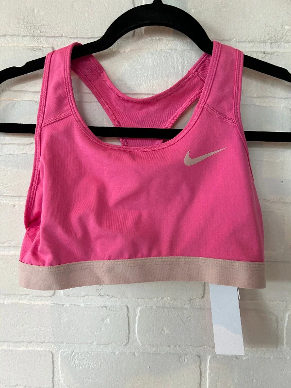 Compression sports bra – Sports bra that compresses the chest for a more secure fit and reduced bounce during high-impact activities.Compression sports bra – Sports bra that compresses the chest for a more secure fit and reduced bounce during high-impact activities.Pink Athletic Bra Nike, Size M Compression sports bra – Sports bra that compresses the chest for a more secure fit and reduced bounce during high-impact activities.Compression sports bra – Sports bra that compresses the chest for a more secure fit and reduced bounce during high-impact activities.Pink Athletic Bra Nike, Size M