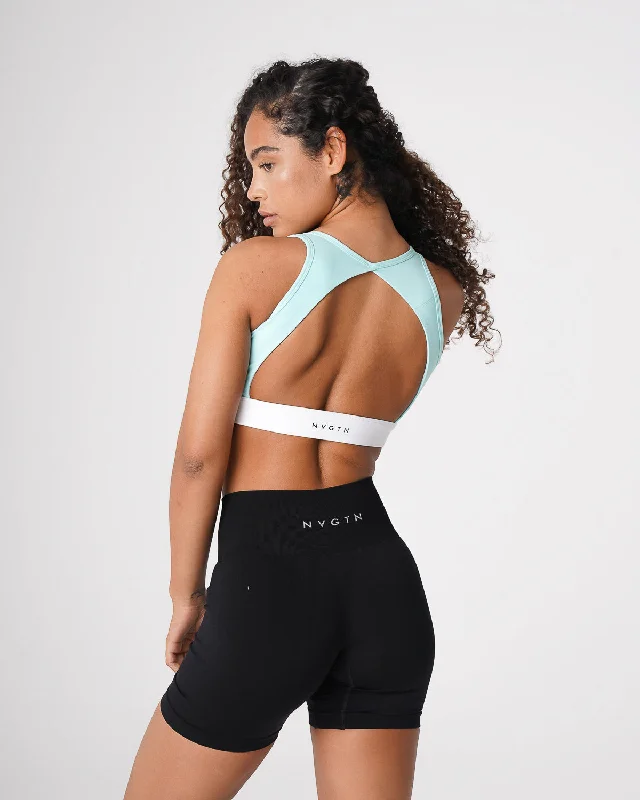 Racerback sports bra – Sports bra with a back design that features straps that meet in a "V" or "Y" shape, offering better shoulder mobility.Racerback sports bra – Sports bra with a back design that features straps that meet in a "V" or "Y" shape, offering better shoulder mobility.Sea Foam Green Agility Bra Racerback sports bra – Sports bra with a back design that features straps that meet in a "V" or "Y" shape, offering better shoulder mobility.Racerback sports bra – Sports bra with a back design that features straps that meet in a "V" or "Y" shape, offering better shoulder mobility.Sea Foam Green Agility Bra