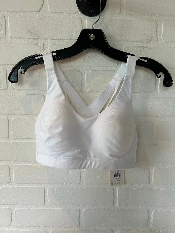 Crossover sports bra – Sports bra with a crossed strap design at the back, offering a stylish and supportive fit.Crossover sports bra – Sports bra with a crossed strap design at the back, offering a stylish and supportive fit.White Athletic Bra Calia, Size M Crossover sports bra – Sports bra with a crossed strap design at the back, offering a stylish and supportive fit.Crossover sports bra – Sports bra with a crossed strap design at the back, offering a stylish and supportive fit.White Athletic Bra Calia, Size M